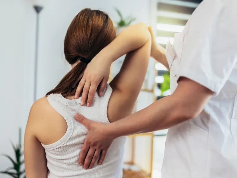 Elbow Pain Treatment Near Me in Clear Lake, WI. Chiropractic Exam for Elbow Pain Relief.
